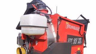 Un brumisateur pour une pailleuse à turbine sans poussière Un brumisateur pour une pailleuse à turbine sans poussière