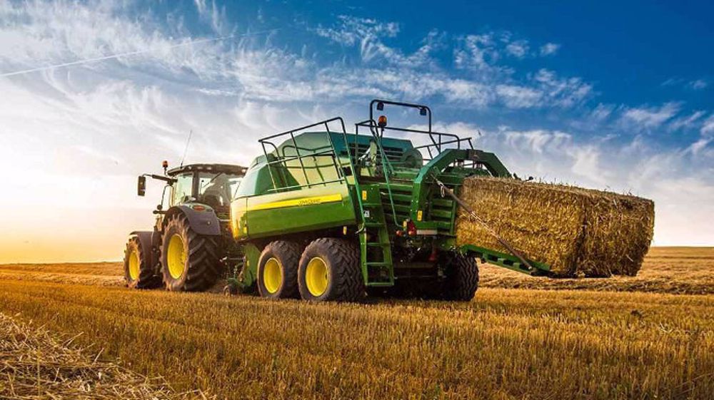 John Deere dévoile la série L1500 pour les chantiers 2015