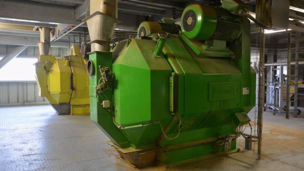 Presses à granulés dans une usine d'aliment du bétail.  (©Terre-net Média)