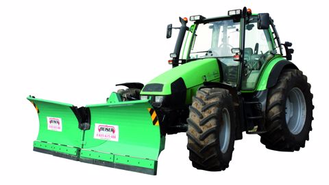 Le tracteur transformé en chasse-neige Le tracteur transformé en chasse-neige