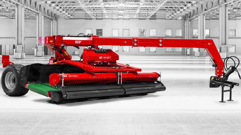 Un andaineur à tapis Un andaineur à tapis