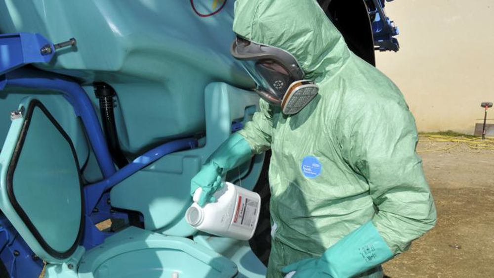 Protections pour traitement phytosanitaire. © Cédric Faimali/GFA