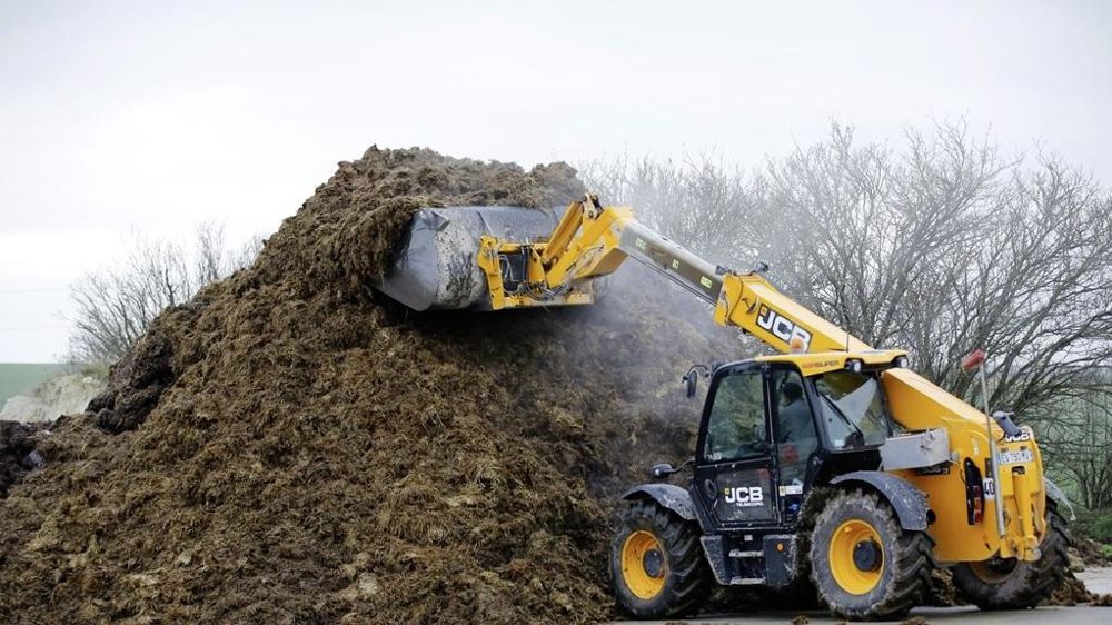 Tas de fumier avec un télescopique